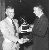 Chester Markham Accepts Varsity Most Valuable Player Award